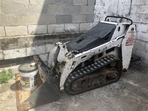 mt 52 55 mini skid steer loader bobcat|bobcat mt52 oil capacity.